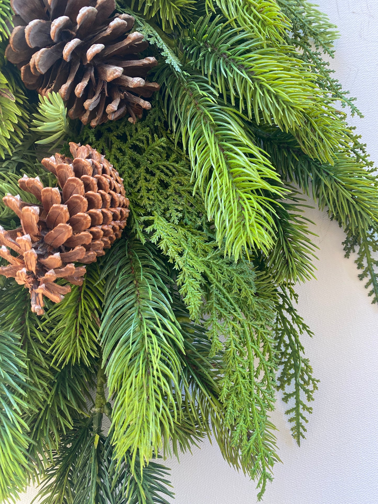 Real Touch Pine Door Swag Artificial . 26" Douglas Fir, Spruce, and Cedar with added Pinecones