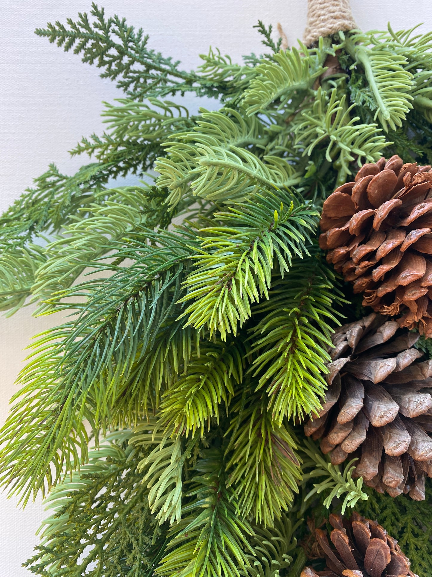 Real Touch Pine Door Swag Artificial . 26" Douglas Fir, Spruce, and Cedar with added Pinecones
