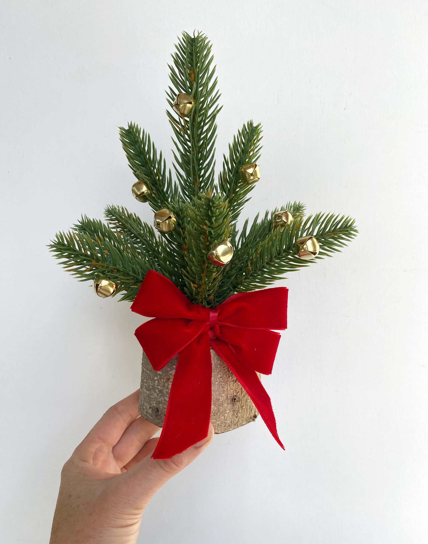 Mini Christmas Tree ā Faux Tabletop Christmas Tree with Red Velvet Ribbon and Gold Bells | Office & Home Holiday Decor