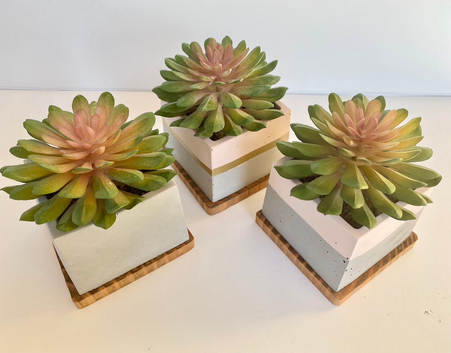 Artificial Pink Succulent Plant in handmade Concrete Pot with Wood Tray