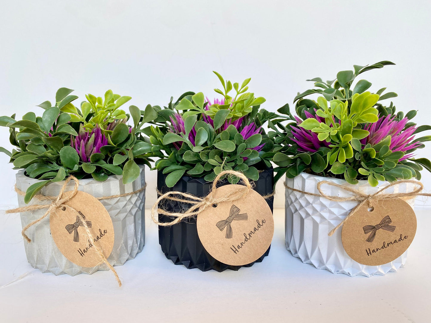 Artificial Plant with pink flowers in handmade Concrete Pot