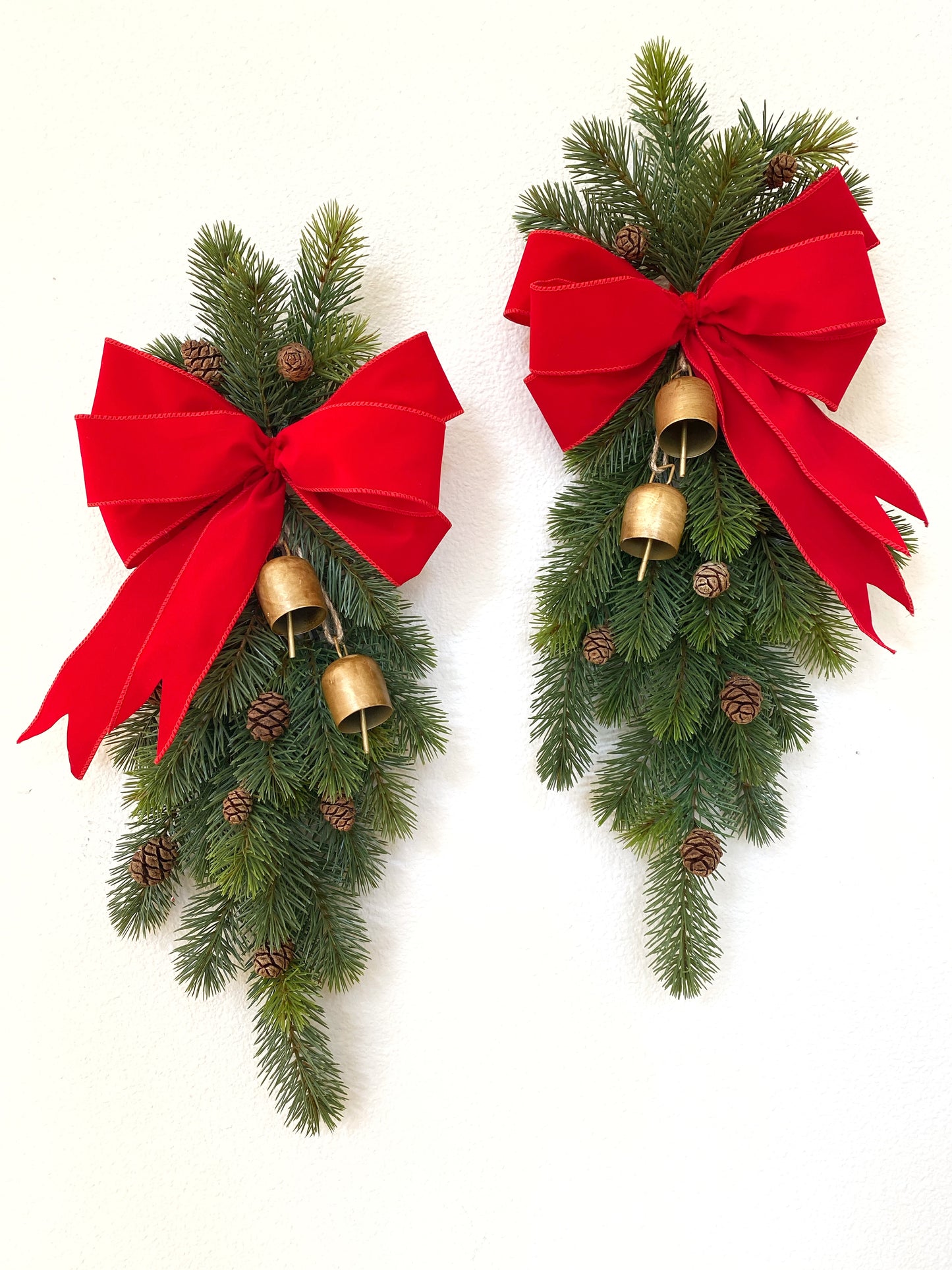 Christmas Door Swag Classic - Real Touch Pine with 2 Brass Bells, Sequoia Pine Cones and red Velvet Bow