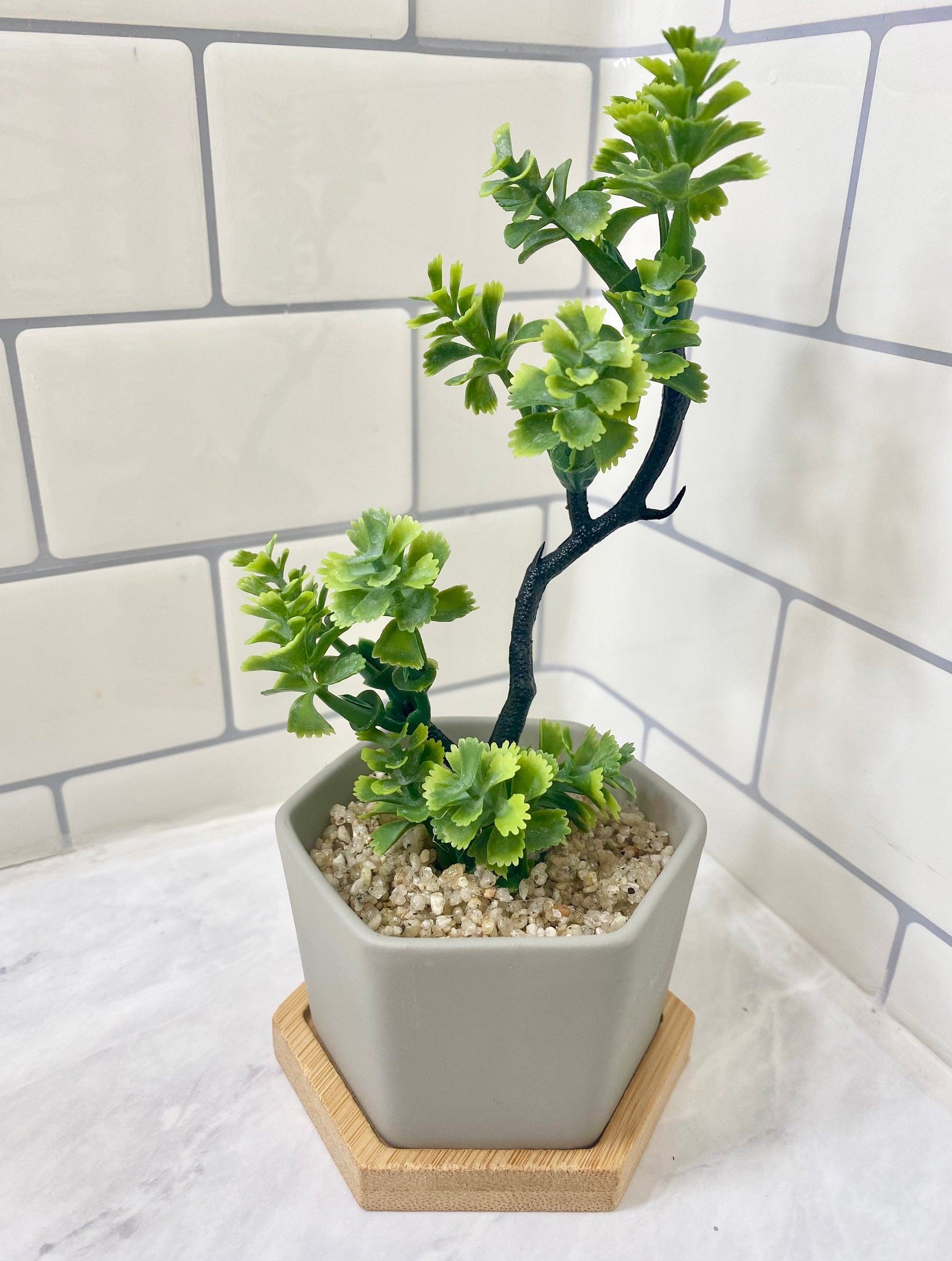 small artificial plants in grey pots 3 x Small Artificial Plant in grey Hexagon Pot with Bamboo Tray – Ursina's Deco Shop